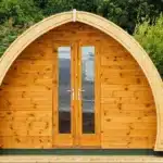 Abri de jardin en bois massif avec bardage neuf, type de structure protégée par la Patine de l'Indien